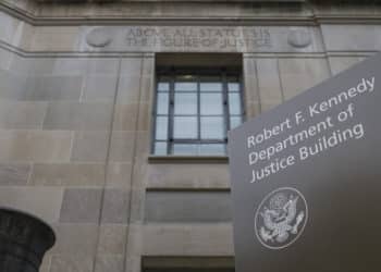 Can courts proceed with a whistleblower suit after the DOJ seeks dismissal?