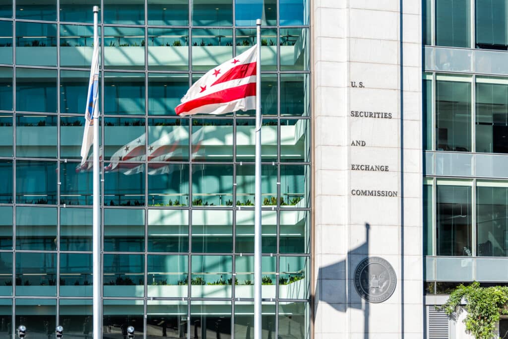 Washington DC, USA - October 12, 2018: US United States Securities and Exchange Commission SEC architecture modern building sign logo red flag and glass windows