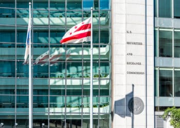 Washington DC, USA - October 12, 2018: US United States Securities and Exchange Commission SEC architecture modern building sign logo red flag and glass windows