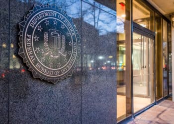 Photo of the exterior of the FBI building, close-up on the FBI seal