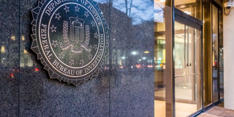 Photo of the exterior of the FBI building, close-up on the FBI seal