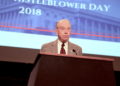 Photo of Chuck Grassley at a podium at the 2018 National Whistleblower Day celebration