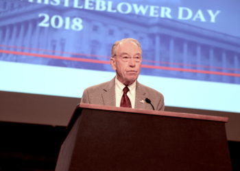 Photo of Chuck Grassley at a podium at the 2018 National Whistleblower Day celebration