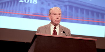 Photo of Chuck Grassley at a podium at the 2018 National Whistleblower Day celebration