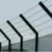 Barbed wire fence with slanted upper part pointing inwards