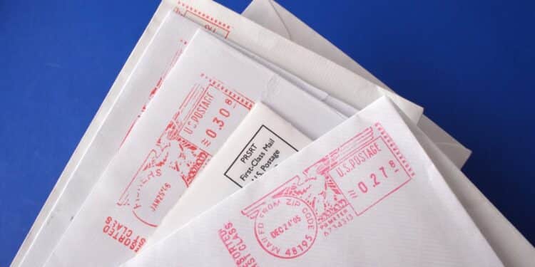 Photo of a small pile of postmarked letters