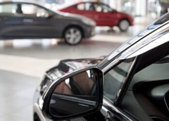 Photo of cars inside of a car dealership