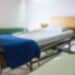 Blurred photo of a hospital/caretaking bed
