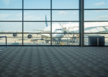 Airplane outside of an air terminal