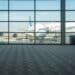 Airplane outside of an air terminal