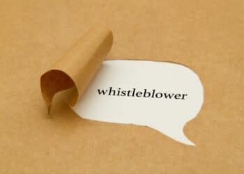 Image of the word "whistleblower" on white paper