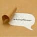 Image of the word "whistleblower" on white paper