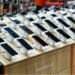 Photo of numerous smartphones on display in a store