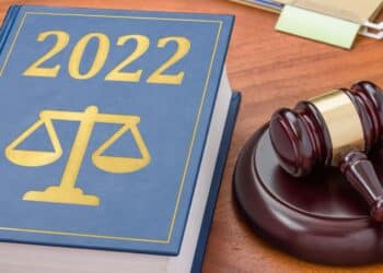 2022 law book with a gavel on a wooden table