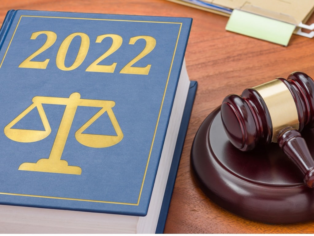 2022 law book with a gavel on a wooden table