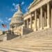 Photo of the U.S. Capitol Building against a blue sky
