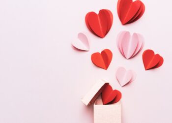 Valentine's Day hearts on a pale pink background