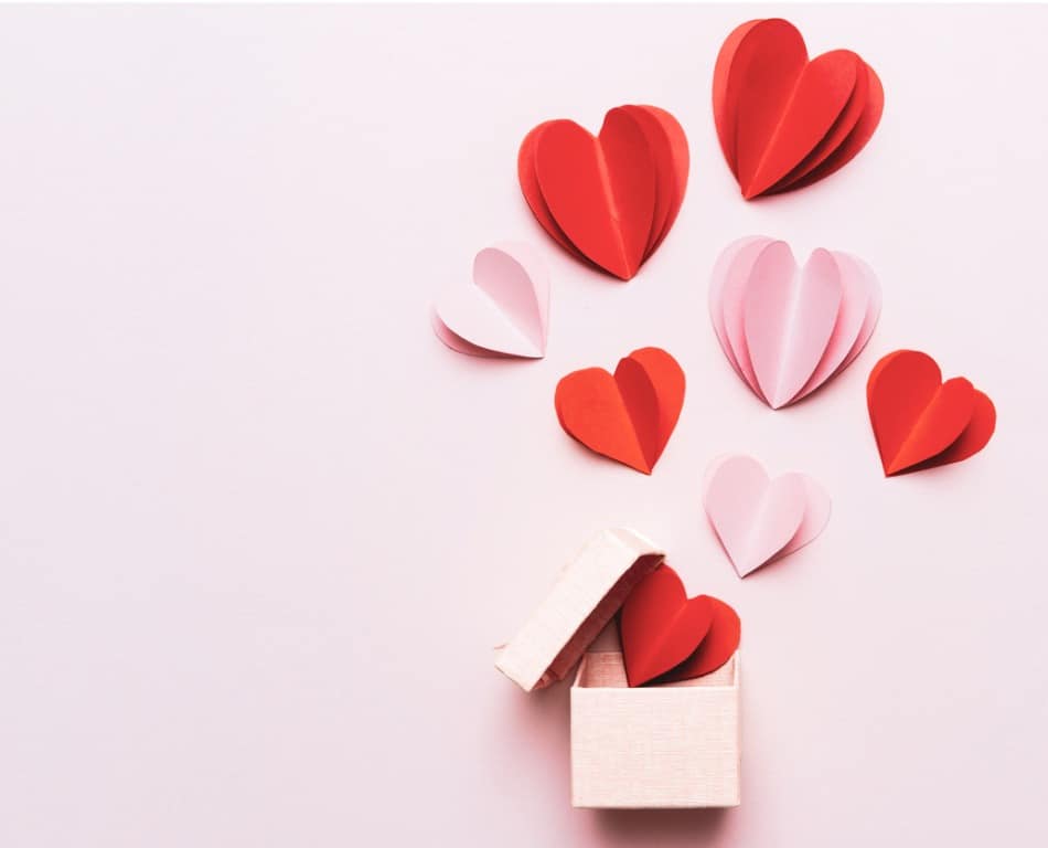 Valentine's Day hearts on a pale pink background